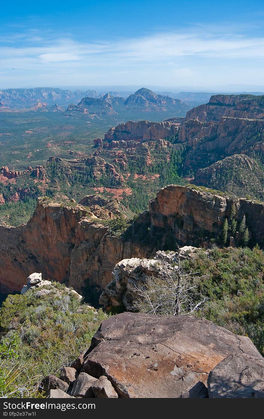 View into Secret Canyon from Little Round Mountain. We headed out of Flagstaff down Woody Mountain Road for a week of camping and day hiking around the Rattlesnake Mesa area. The area is north of Sedona&#x27;s Secret Canyon, on top of the Mogollon Rim. There are several trails, mostly unmaintained, heading along or off the edge of the Rim. For the first day&#x27;s hike, we headed for FS Trail #9, which heads across Little Round Mountain and along the Rim around South Pocket... Read the blog entry for this hike