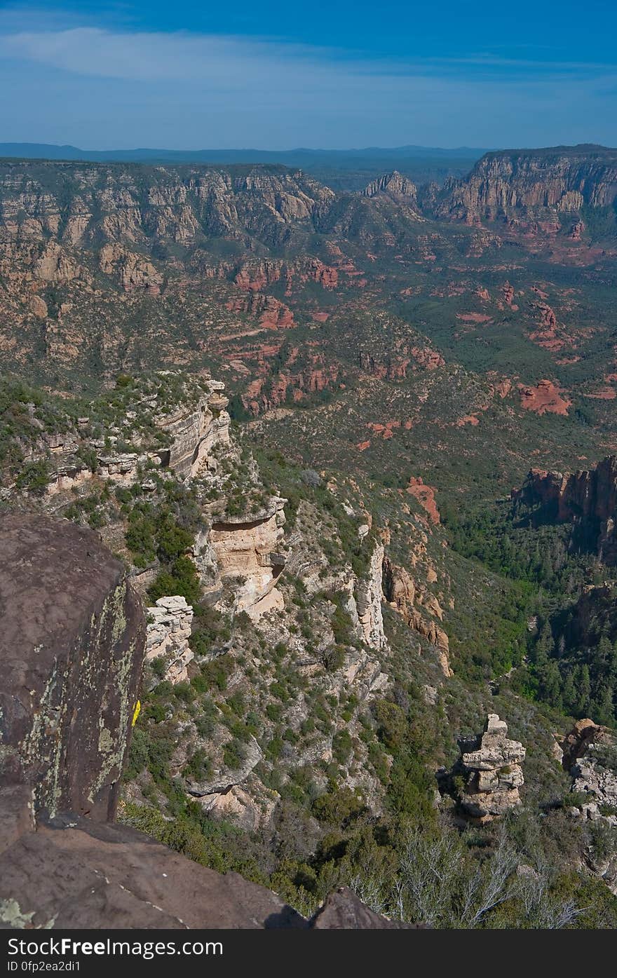 View into Secret Canyon from Little Round Mountain. We headed out of Flagstaff down Woody Mountain Road for a week of camping and day hiking around the Rattlesnake Mesa area. The area is north of Sedona&#x27;s Secret Canyon, on top of the Mogollon Rim. There are several trails, mostly unmaintained, heading along or off the edge of the Rim. For the first day&#x27;s hike, we headed for FS Trail #9, which heads across Little Round Mountain and along the Rim around South Pocket... Read the blog entry for this hike