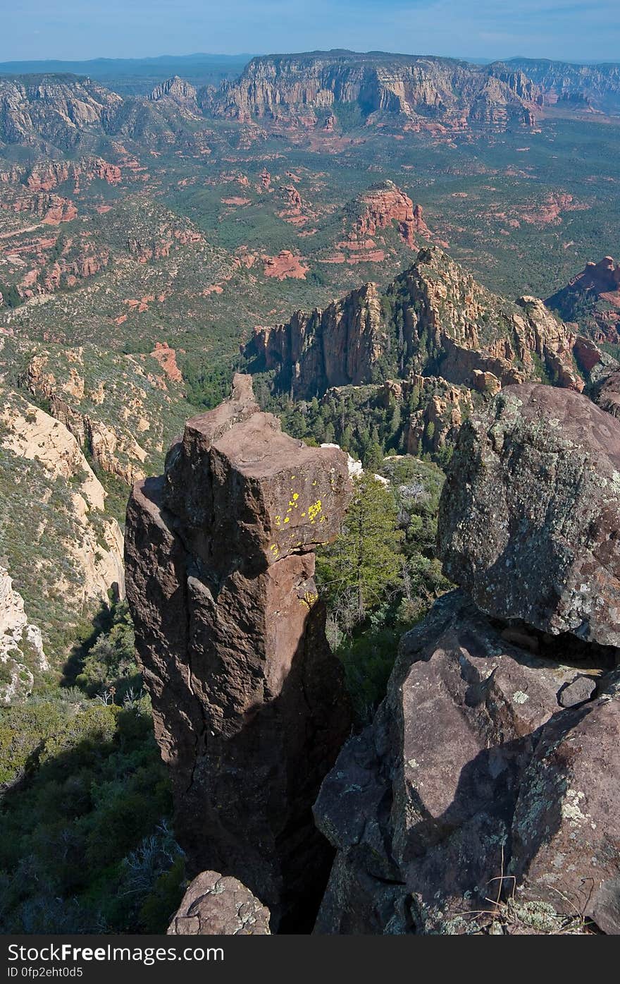 View into Secret Canyon from Little Round Mountain. We headed out of Flagstaff down Woody Mountain Road for a week of camping and day hiking around the Rattlesnake Mesa area. The area is north of Sedona&#x27;s Secret Canyon, on top of the Mogollon Rim. There are several trails, mostly unmaintained, heading along or off the edge of the Rim. For the first day&#x27;s hike, we headed for FS Trail #9, which heads across Little Round Mountain and along the Rim around South Pocket... Read the blog entry for this hike