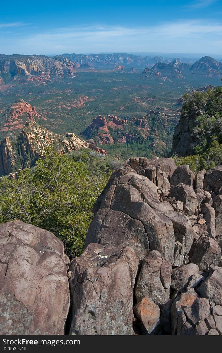 View into Secret Canyon from Little Round Mountain. We headed out of Flagstaff down Woody Mountain Road for a week of camping and day hiking around the Rattlesnake Mesa area. The area is north of Sedona&#x27;s Secret Canyon, on top of the Mogollon Rim. There are several trails, mostly unmaintained, heading along or off the edge of the Rim. For the first day&#x27;s hike, we headed for FS Trail #9, which heads across Little Round Mountain and along the Rim around South Pocket... Read the blog entry for this hike