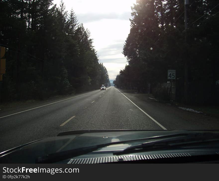 Sky, Cloud, Automotive lighting, Hood, Motor vehicle, Natural landscape