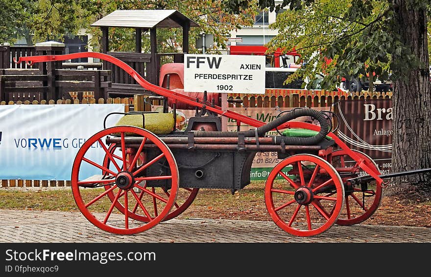 An antique 1902 pferdespritze fire brigade vehicle.