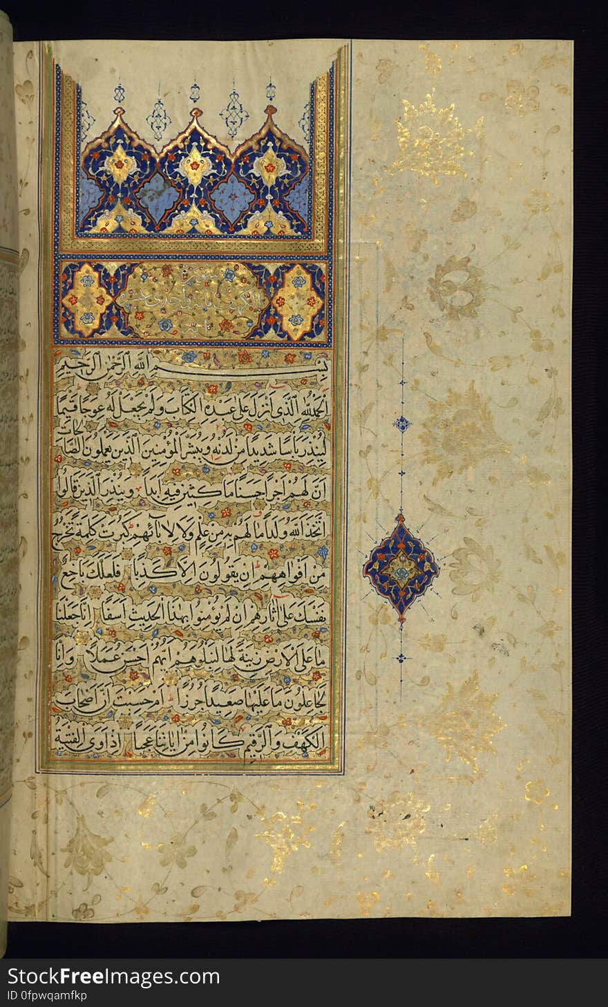 An illuminated large size copy of the Koran &#x28;Qur&#x27;an&#x29; produced in the 11th century AH / 17th CE in Iran. Apart from using a number of scripts, such as naskh, muḥaqqaq and tawqīʿ, this codex features six pairs of decorated pages, two illuminated headpieces, as well as illuminated chapter headings, cloud-bands, and marginal decoration. The black morocco binding has a central piece in the form of a diamond with pendants on four sides. The inner covers, having a traditional dentelle decoration, features text from the &#x22;the verse of the throne&#x22; &#x28;āyat al-kursī&#x29;, which is inscribed in the outer frame. This is a decorated incipit page with illuminated headpiece introducing chapter 18, Sūrat al-kahf. An illuminated large size copy of the Koran &#x28;Qur&#x27;an&#x29; produced in the 11th century AH / 17th CE in Iran. Apart from using a number of scripts, such as naskh, muḥaqqaq and tawqīʿ, this codex features six pairs of decorated pages, two illuminated headpieces, as well as illuminated chapter headings, cloud-bands, and marginal decoration. The black morocco binding has a central piece in the form of a diamond with pendants on four sides. The inner covers, having a traditional dentelle decoration, features text from the &#x22;the verse of the throne&#x22; &#x28;āyat al-kursī&#x29;, which is inscribed in the outer frame. This is a decorated incipit page with illuminated headpiece introducing chapter 18, Sūrat al-kahf.