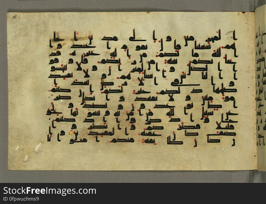 This horizontal-format manuscript on parchment is an illuminated fragment of the Qur&#x27;an, covering chapter 6 &#x28;Sūrat al-anʿām&#x29;, the end of verse 54, through chapter 9 &#x28;Sūrat al-tawbah&#x29;, verse 79. The fragment probably dates to the third century AH / ninth CE. The text is written in an Early Abbasid &#x28;Kufic&#x29; script in dark brown ink and vocalized with red dots. Chapter headings are in gold ink, and verse markers in the shape of a stylized letter hā&#x27; and rosettes with colored dots indicate groups of five and ten verses. The green goatskin binding with gold-painted central floral design and cornerpieces is thirteenth century AH / nineteenth CE or later. See this manuscript page by page at the Walters Museum Website: art.thewalters.org/viewwoa.aspx?id=1528. This horizontal-format manuscript on parchment is an illuminated fragment of the Qur&#x27;an, covering chapter 6 &#x28;Sūrat al-anʿām&#x29;, the end of verse 54, through chapter 9 &#x28;Sūrat al-tawbah&#x29;, verse 79. The fragment probably dates to the third century AH / ninth CE. The text is written in an Early Abbasid &#x28;Kufic&#x29; script in dark brown ink and vocalized with red dots. Chapter headings are in gold ink, and verse markers in the shape of a stylized letter hā&#x27; and rosettes with colored dots indicate groups of five and ten verses. The green goatskin binding with gold-painted central floral design and cornerpieces is thirteenth century AH / nineteenth CE or later. See this manuscript page by page at the Walters Museum Website: art.thewalters.org/viewwoa.aspx?id=1528