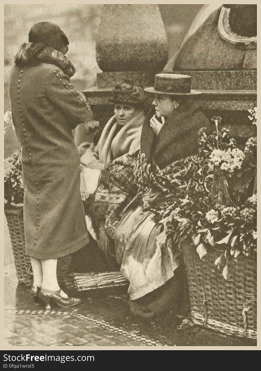 Piccadilly Circus, London Photogravure by Donald Macleish from Wonderful London by St John Adcock, 1927. At Piccadilly Circus the flower seller is to be observed in her most prosperous state. At one time the flower sellers of London dealt for the lost-part in buttonholes, because the City clientele was almost exclusively male. Now cut flowers are on sale as a sign of feminine custom. More at www.wonderfullondon.tumblr.com/