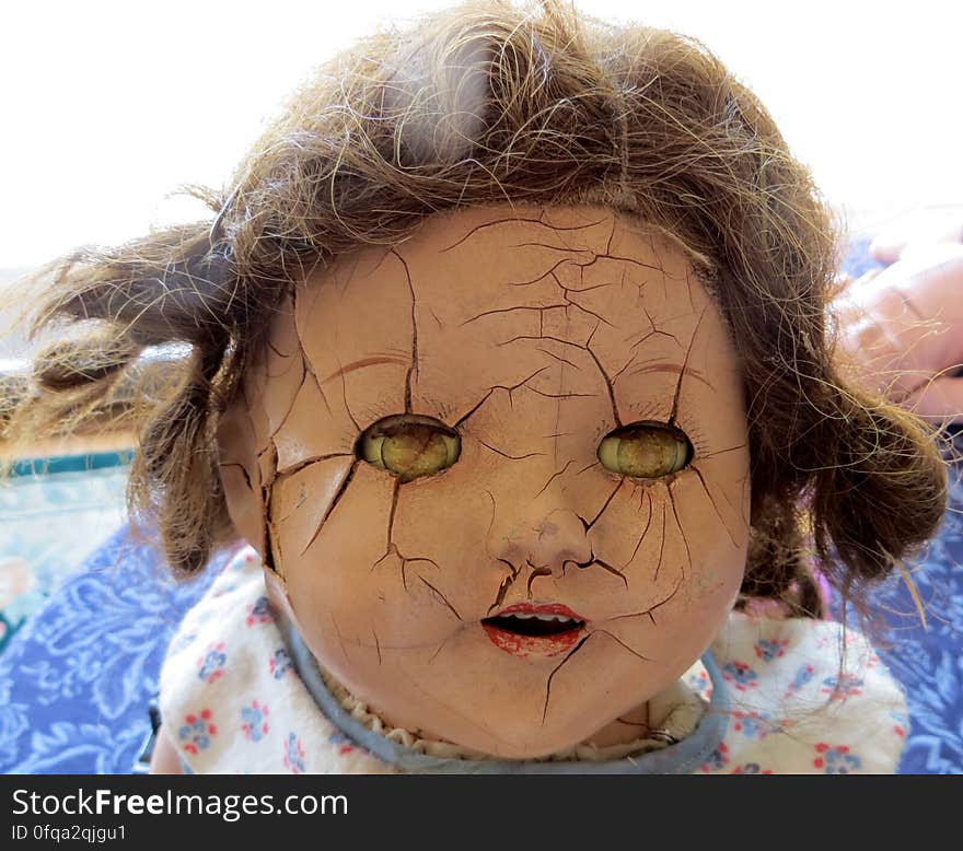 cracked doll head