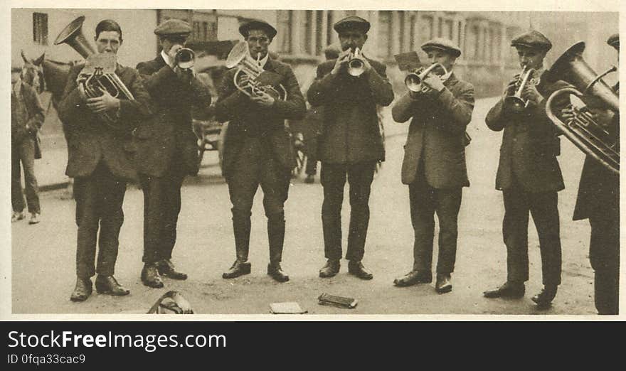 Lothbury, London Photogravure by Donald Macleish from Wonderful London by St John Adcock, 1927. The German bands that disappeared with the Great War have been replaced by ex-soldiers and unemployed; and though statistics are urgently needed giving the percentages of genuine cases, it is only too certain that in the main the picture is a true one. Lothbury, London Photogravure by Donald Macleish from Wonderful London by St John Adcock, 1927. The German bands that disappeared with the Great War have been replaced by ex-soldiers and unemployed; and though statistics are urgently needed giving the percentages of genuine cases, it is only too certain that in the main the picture is a true one.