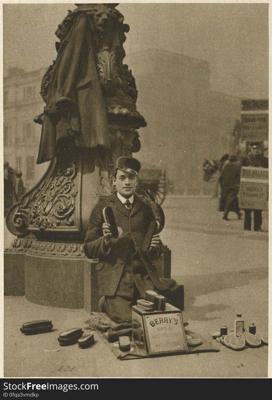 the bootblack Photogravure by Donald Macleish from Wonderful London by St John Adcock, 1927. For many years, men who follow the bootblack&#x27;s calling have gathered themselves into trade societies, according to their districts, and some of these have special uniforms. In the City this is red. On their coats the members wear a large metal badgge with the name of their society and their own number on it. More at www.wonderfullondon.tumblr.com/