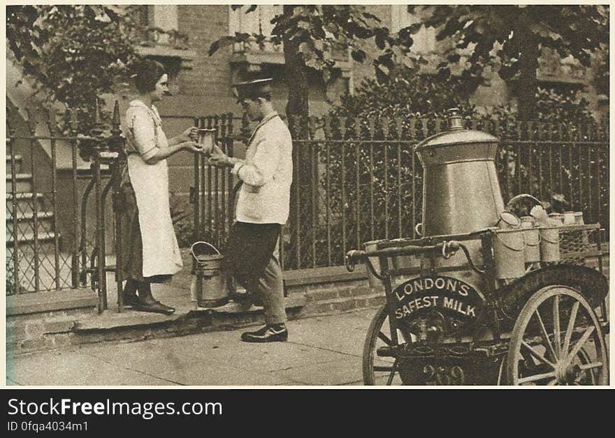 London, 1920s Photogravure by Donald Macleish from Wonderful London by St John Adcock, 1927. From the section entitled Some of the sights and sounds that liven London streets: A north London milkman. The three-wheeled trolley of the milkman in a fairly small way is disappearing in favour of the motor van and the big combine. London, 1920s Photogravure by Donald Macleish from Wonderful London by St John Adcock, 1927. From the section entitled Some of the sights and sounds that liven London streets: A north London milkman. The three-wheeled trolley of the milkman in a fairly small way is disappearing in favour of the motor van and the big combine