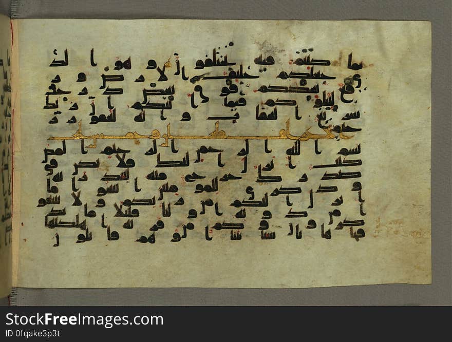 This horizontal-format manuscript on parchment is an illuminated fragment of the Qur&#x27;an, covering chapter 6 &#x28;Sūrat al-anʿām&#x29;, the end of verse 54, through chapter 9 &#x28;Sūrat al-tawbah&#x29;, verse 79. The fragment probably dates to the third century AH / ninth CE. The text is written in an Early Abbasid &#x28;Kufic&#x29; script in dark brown ink and vocalized with red dots. Chapter headings are in gold ink, and verse markers in the shape of a stylized letter hā&#x27; and rosettes with colored dots indicate groups of five and ten verses. The green goatskin binding with gold-painted central floral design and cornerpieces is thirteenth century AH / nineteenth CE or later. See this manuscript page by page at the Walters Museum Website: art.thewalters.org/viewwoa.aspx?id=1528. This horizontal-format manuscript on parchment is an illuminated fragment of the Qur&#x27;an, covering chapter 6 &#x28;Sūrat al-anʿām&#x29;, the end of verse 54, through chapter 9 &#x28;Sūrat al-tawbah&#x29;, verse 79. The fragment probably dates to the third century AH / ninth CE. The text is written in an Early Abbasid &#x28;Kufic&#x29; script in dark brown ink and vocalized with red dots. Chapter headings are in gold ink, and verse markers in the shape of a stylized letter hā&#x27; and rosettes with colored dots indicate groups of five and ten verses. The green goatskin binding with gold-painted central floral design and cornerpieces is thirteenth century AH / nineteenth CE or later. See this manuscript page by page at the Walters Museum Website: art.thewalters.org/viewwoa.aspx?id=1528