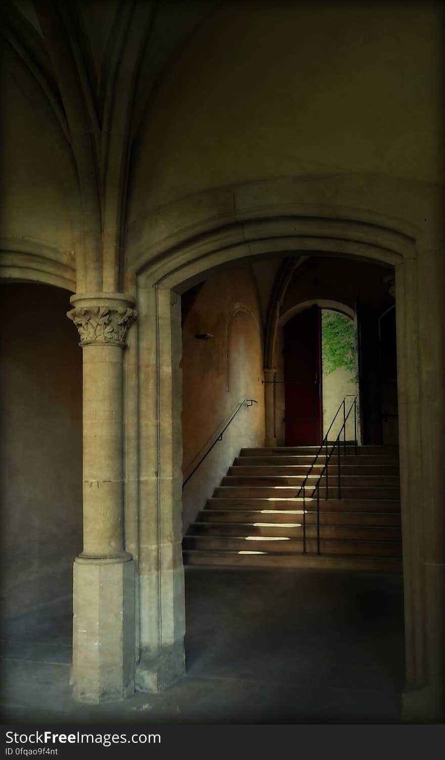 Beige Stone Stairway by Brown Door