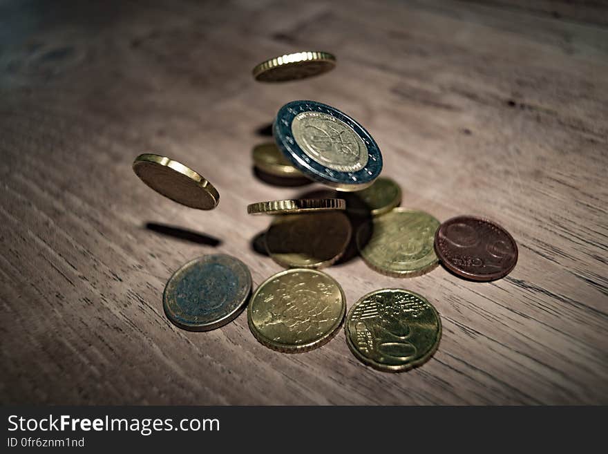 Close-up of Coins on Table