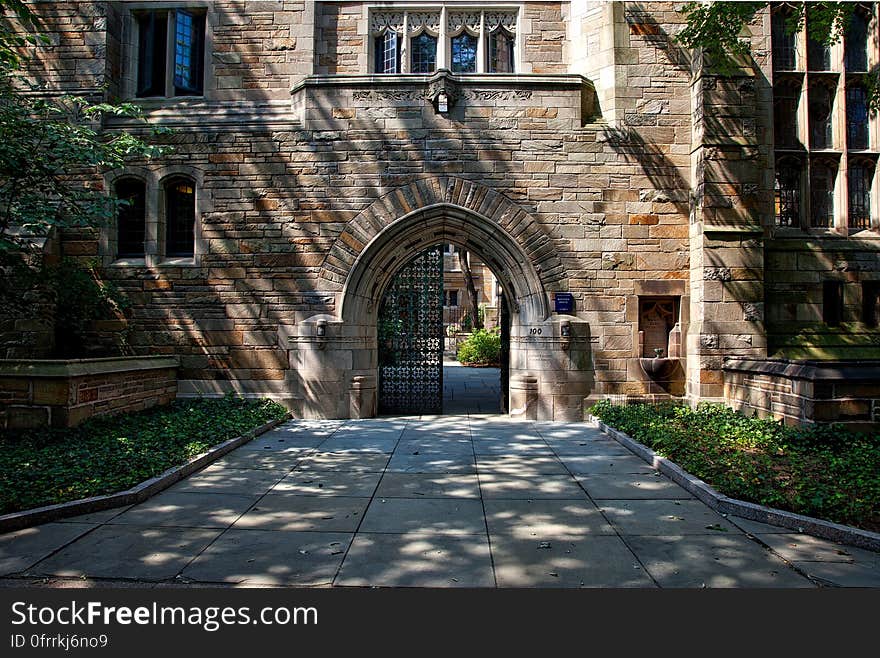 Steel Gate of Brown Brick Building