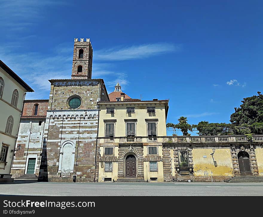 The bell tower of St. Giovanni`s church from the cathedral square of St. Martino. The bell tower of St. Giovanni`s church from the cathedral square of St. Martino
