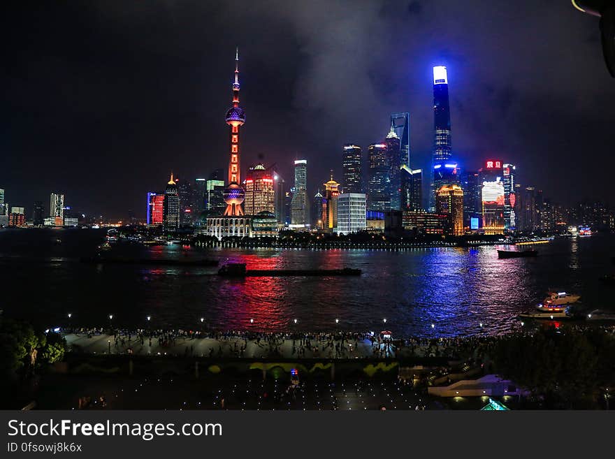 A view of the Shanghai financial center across the Huangpu river at night.