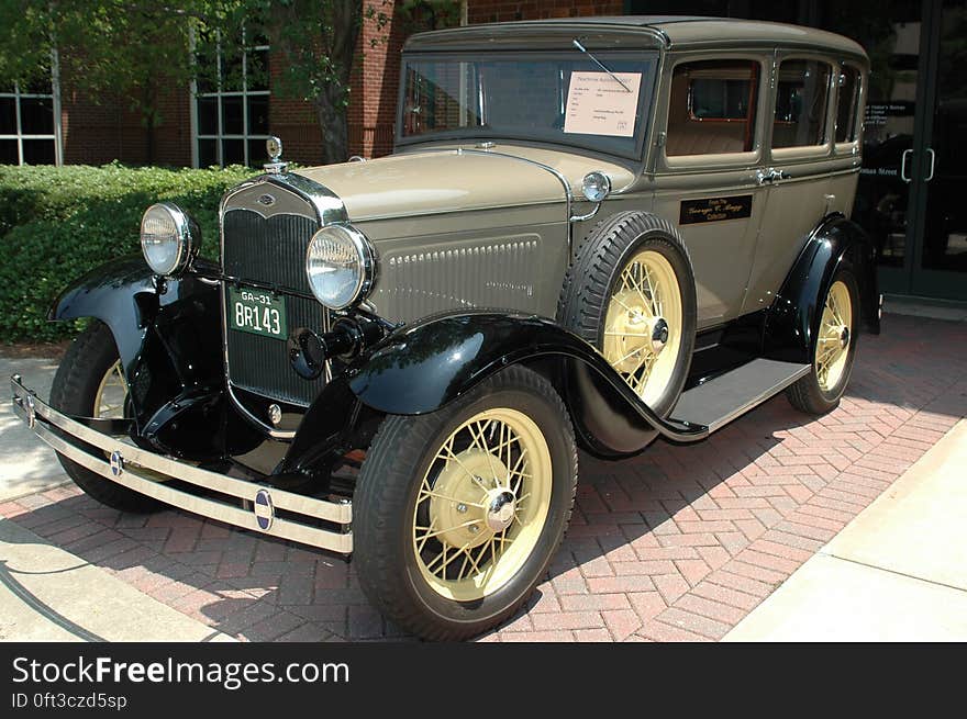 Luxury oldtimer car in olive green color.