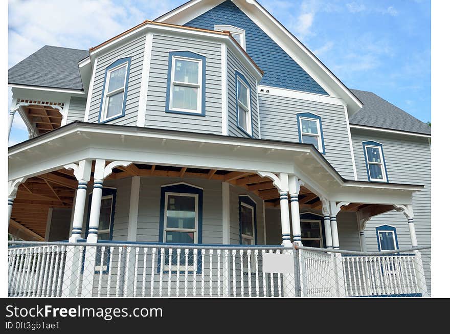 Blue and White 2 Story Hous E