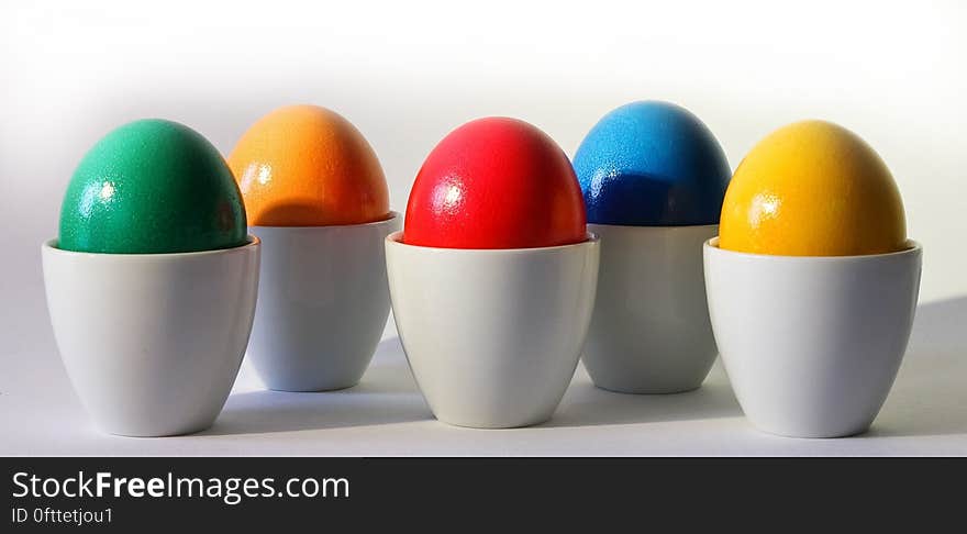 Multicolored Egg Ornament on White Desk