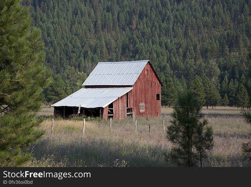 Red Wooden Barn during Daytime