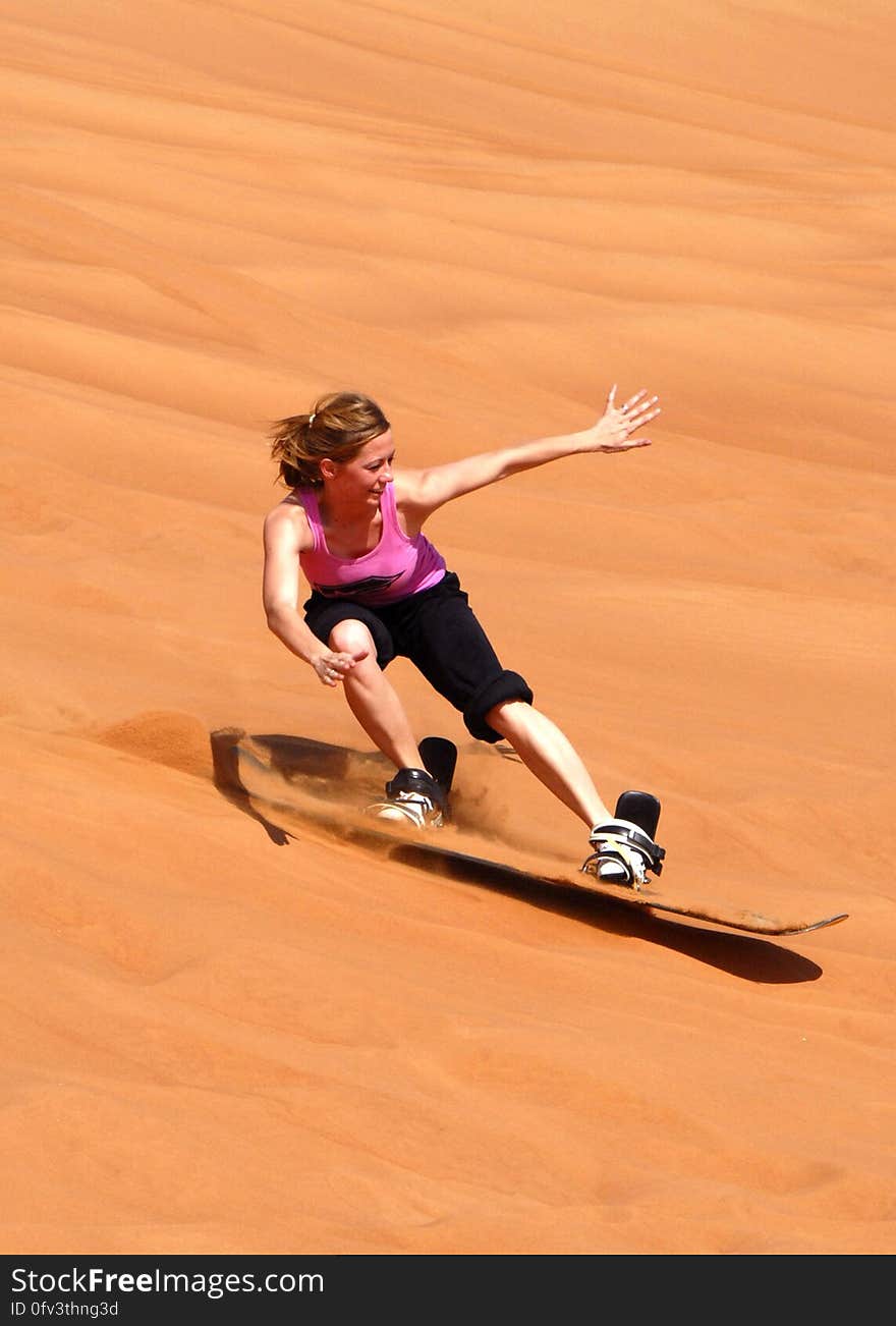 Woman in Doing Sun Boarding during Daytime