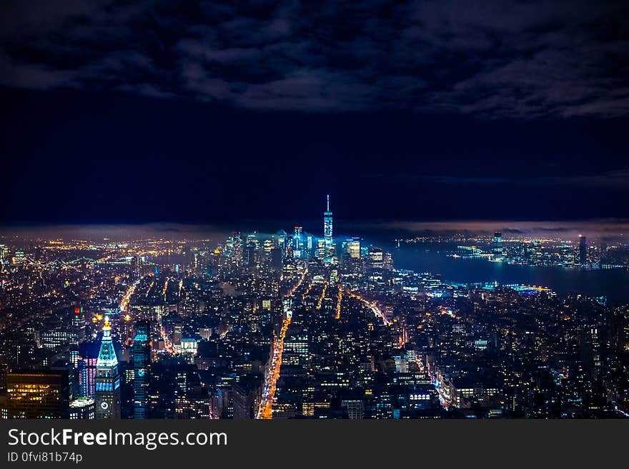 A panoramic view of a metropolitan city at night. A panoramic view of a metropolitan city at night.