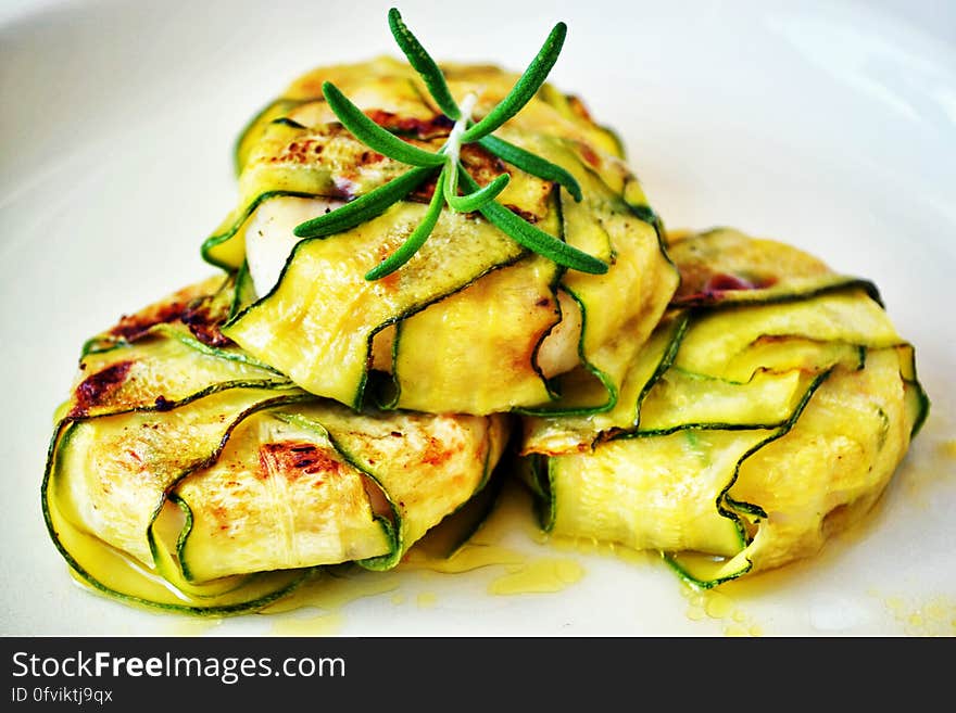 Three steaks consisting of slices of zucchini. Three steaks consisting of slices of zucchini.