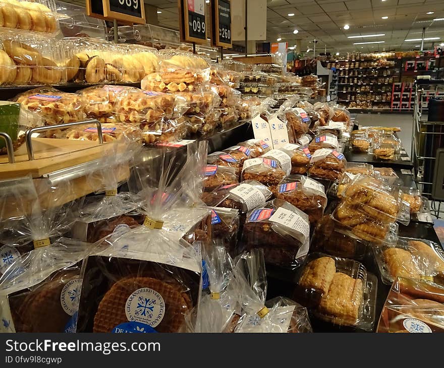 A shelf full of different types of cookies and treats. In the lower left corner you can see &#x27;stroopwafels&#x27;, these are a traditional snack in the Netherlands. The &#x27;stroopwafels&#x27; consist of two thin waffles with syrup in between. Personally I prefer healthier snacks, but in some exceptional situaties a stroopwafel is nice too ;&#x29; I make photos that can be used for free by anyone. The free stock photos can be used for your blog, website or business. All photos are Creative Commons Public Domain Dedicated &#x28;CC0&#x29;. For free new daily photos you can follow my StockyPics flickr-page or check my site :&#x29;. A shelf full of different types of cookies and treats. In the lower left corner you can see &#x27;stroopwafels&#x27;, these are a traditional snack in the Netherlands. The &#x27;stroopwafels&#x27; consist of two thin waffles with syrup in between. Personally I prefer healthier snacks, but in some exceptional situaties a stroopwafel is nice too ;&#x29; I make photos that can be used for free by anyone. The free stock photos can be used for your blog, website or business. All photos are Creative Commons Public Domain Dedicated &#x28;CC0&#x29;. For free new daily photos you can follow my StockyPics flickr-page or check my site :&#x29;