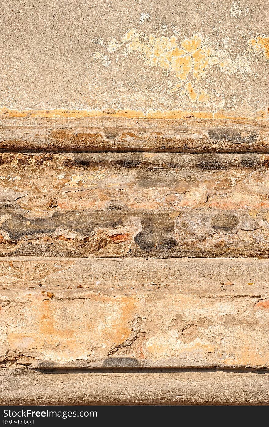 A close up of a weathered wall background.