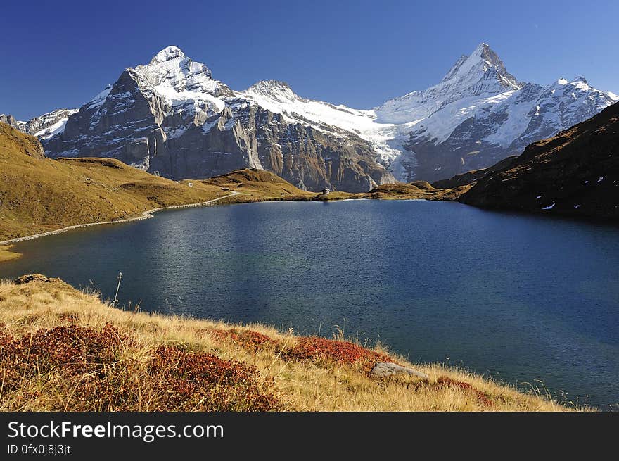 A mountain landscape with blue lake. A mountain landscape with blue lake.