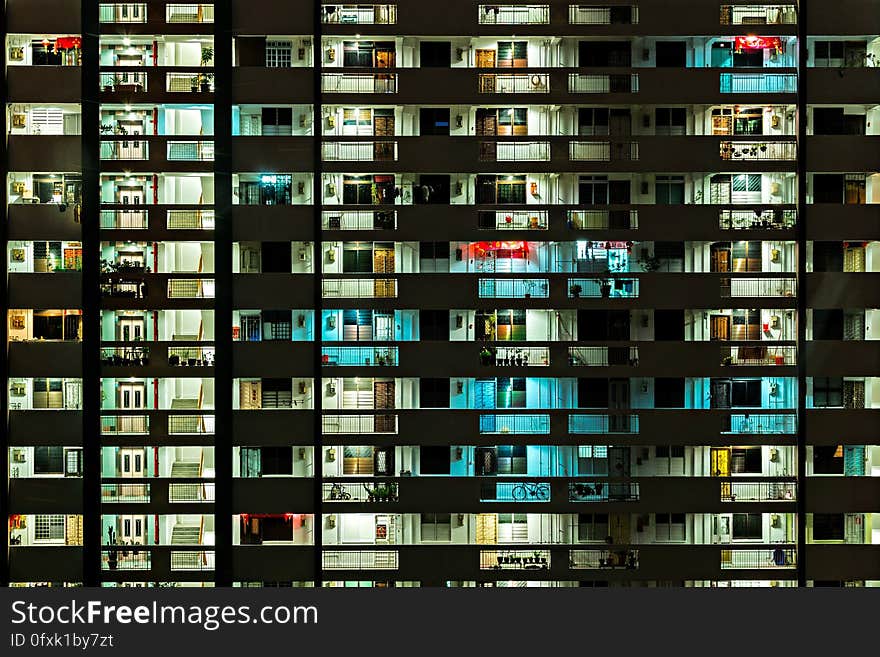 Exterior of modern apartment or office block. illuminated at night. Exterior of modern apartment or office block. illuminated at night