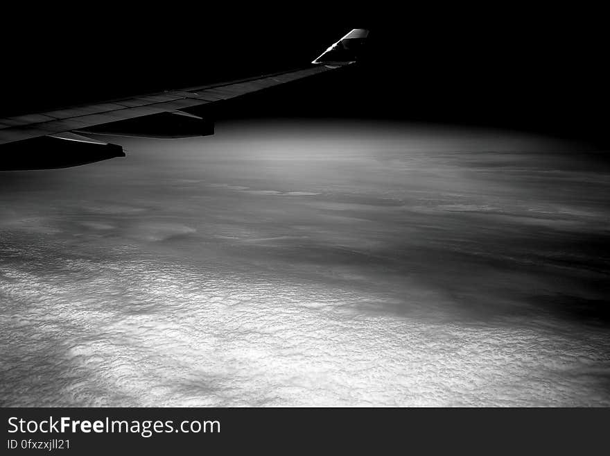 Airplane Wing in Gray Scale Photohraphy