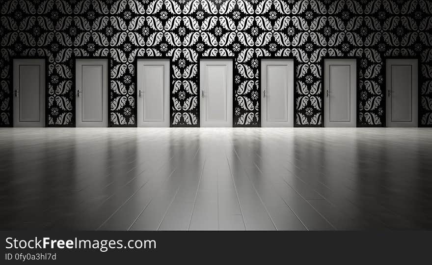 A room with many doors and decorative wallpaper. A room with many doors and decorative wallpaper.