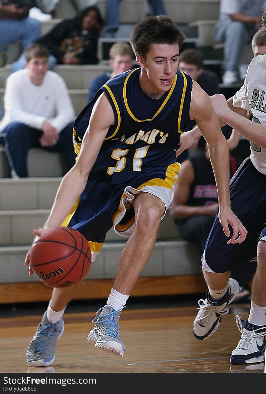 Basketball players on the court during a game.