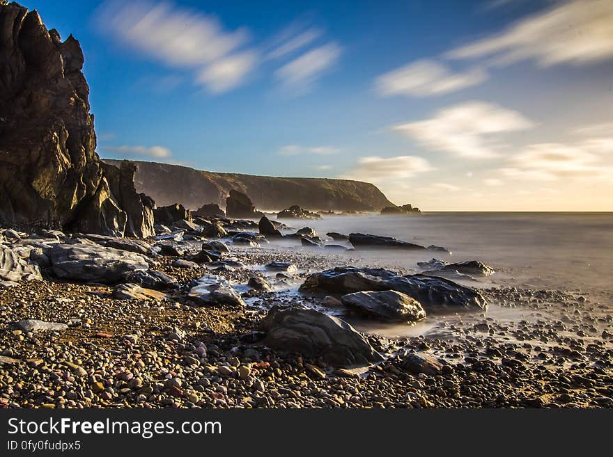 Scenic View of Sea Against Dramatic Sky