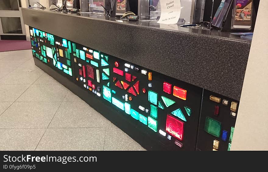 The illuminated counter was a feature of this bank branch for decades, although it had been cut down a bit from its original size when this picture was taken in 2014. With counters out of fashion in banks nowadays, this counter has since been removed. Happily, a small part of the glasswork has been retained as a wall decoration. The illuminated counter was a feature of this bank branch for decades, although it had been cut down a bit from its original size when this picture was taken in 2014. With counters out of fashion in banks nowadays, this counter has since been removed. Happily, a small part of the glasswork has been retained as a wall decoration.