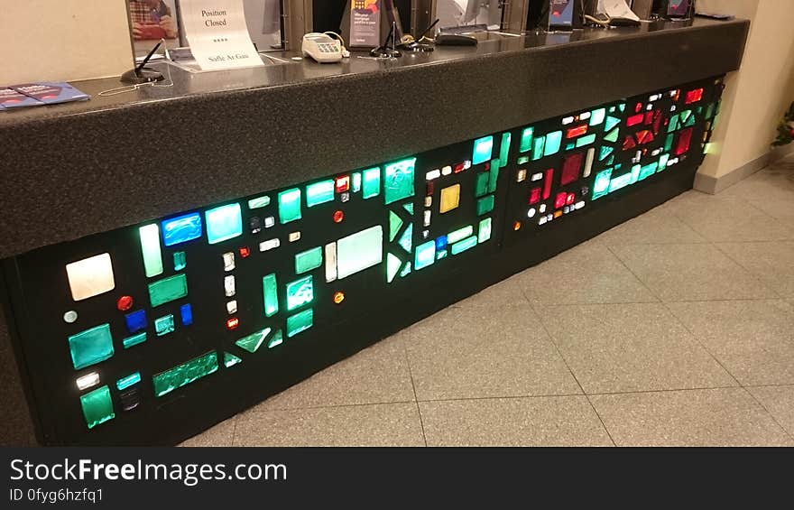 The illuminated counter was a feature of this bank branch for decades, although it had been cut down a bit from its original size when this picture was taken in 2014. With counters out of fashion in banks nowadays, this counter has since been removed. Happily, a small part of the glasswork has been retained as a wall decoration. The illuminated counter was a feature of this bank branch for decades, although it had been cut down a bit from its original size when this picture was taken in 2014. With counters out of fashion in banks nowadays, this counter has since been removed. Happily, a small part of the glasswork has been retained as a wall decoration.