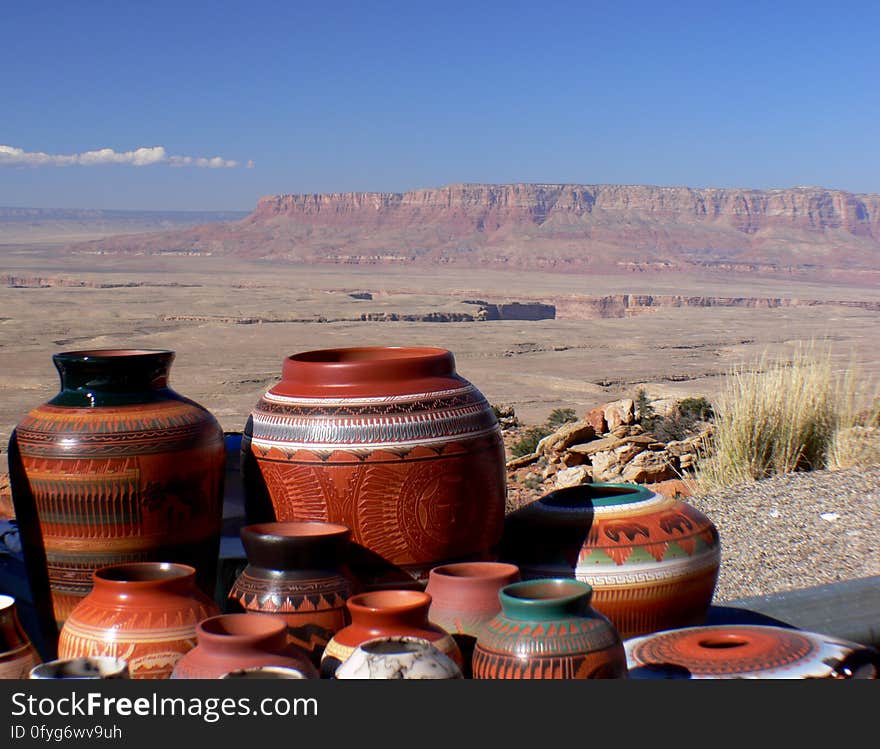 North American Indian pottery dates back at least 2,000 years, when the nomadic people settled into an agricultural lifestyle, creating a need for vessels to gather and store water and grains. Over the years, the purpose of Navajo pottery has changed from functional to ceremonial to artistic. North American Indian pottery dates back at least 2,000 years, when the nomadic people settled into an agricultural lifestyle, creating a need for vessels to gather and store water and grains. Over the years, the purpose of Navajo pottery has changed from functional to ceremonial to artistic.