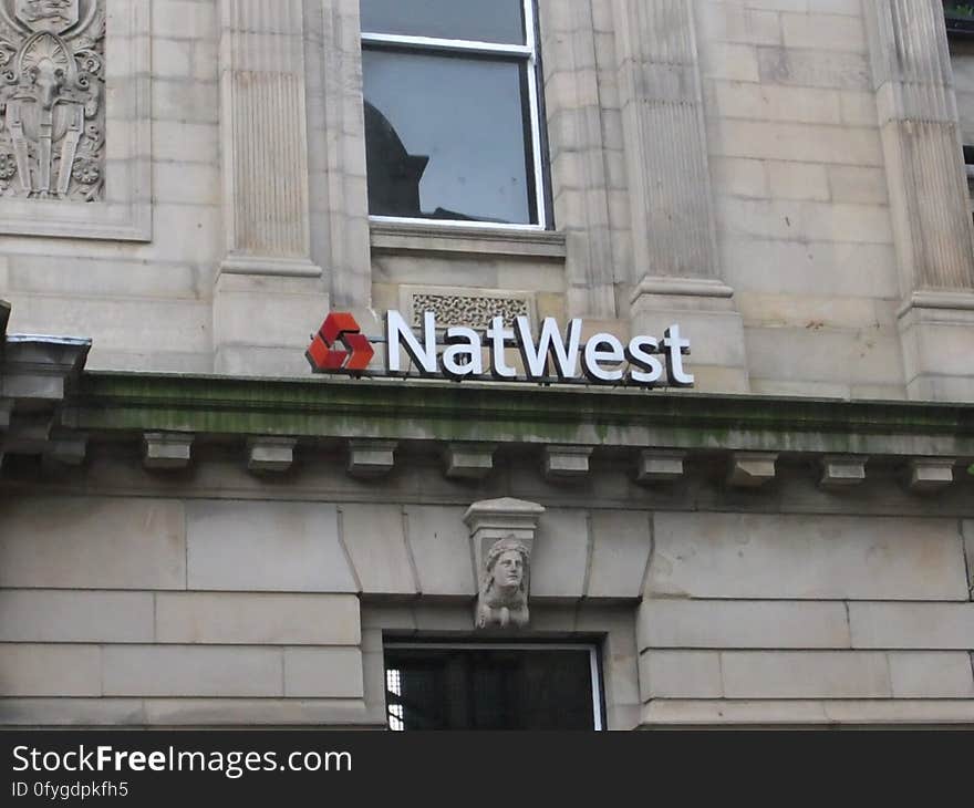 NatWest bank branch with a back-to-front logo on their sign. Not sure how that could have happened!. NatWest bank branch with a back-to-front logo on their sign. Not sure how that could have happened!