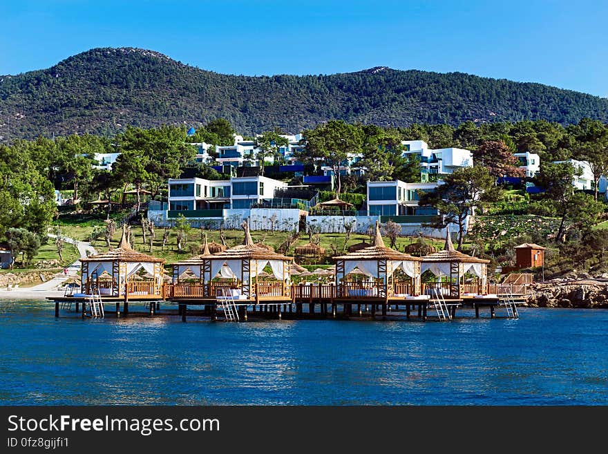 A view of the waterfront of a small town. A view of the waterfront of a small town.