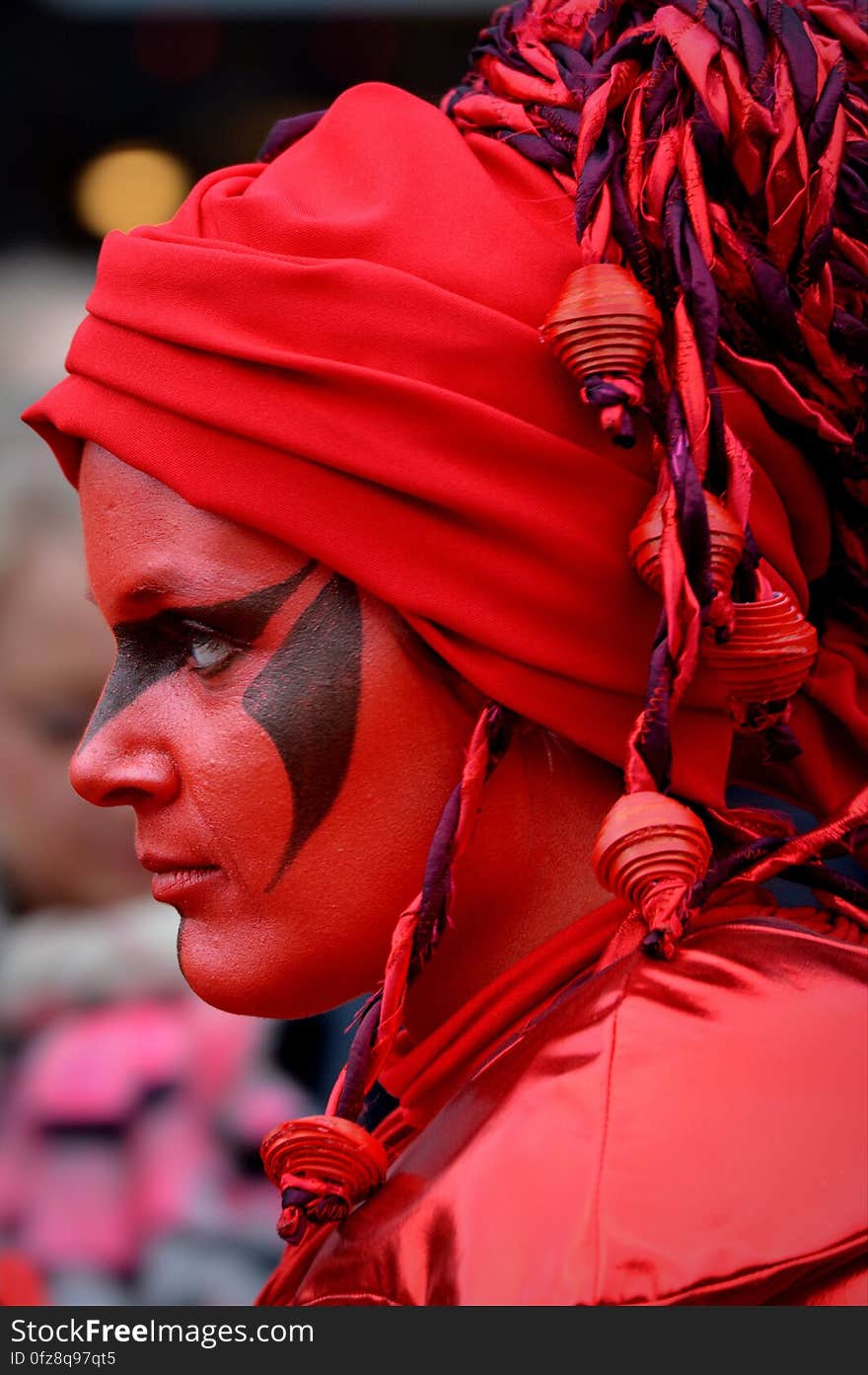 Woman Wearing Red and Purple Head Wrap