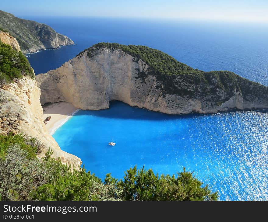 Blue Sea Under Clear Blue Sky