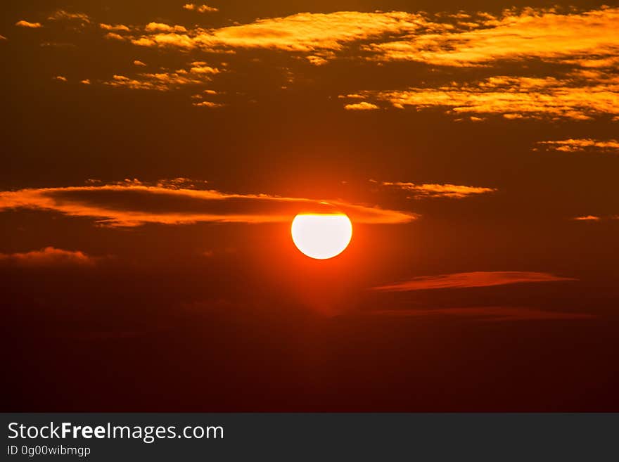 Orange skies with clouds at sunset. Orange skies with clouds at sunset.