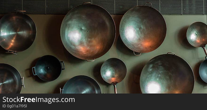 Empty Cooking Pans on Table Top