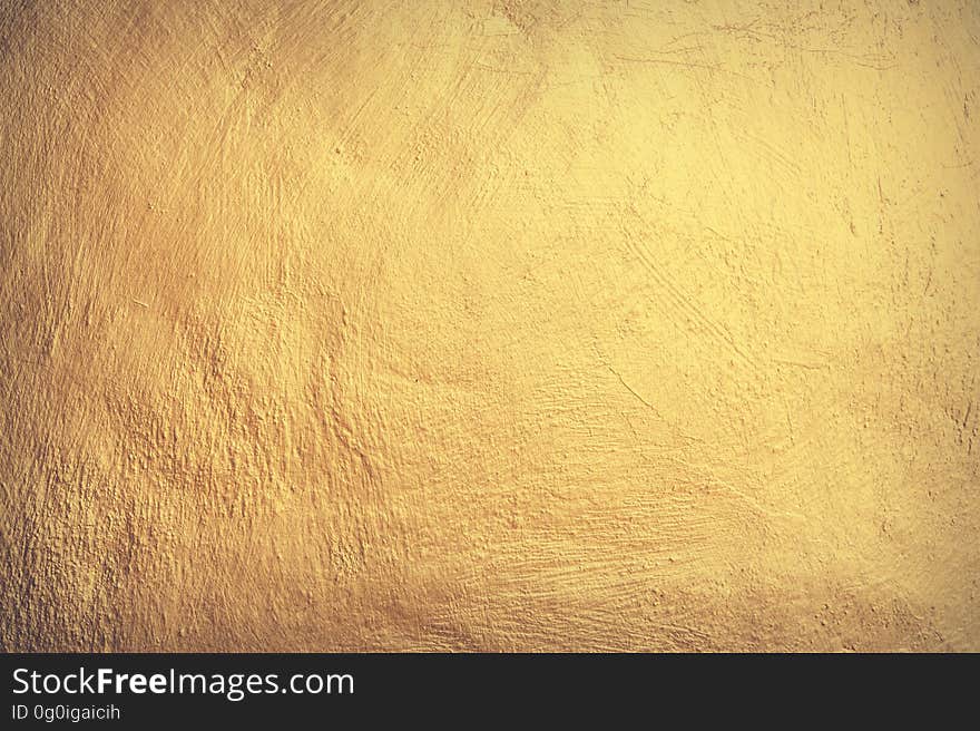 Background created by textured yellow (pale gold) vintage wallpaper. Background created by textured yellow (pale gold) vintage wallpaper.