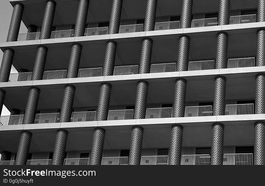 A building with balconies and pillars. A building with balconies and pillars.