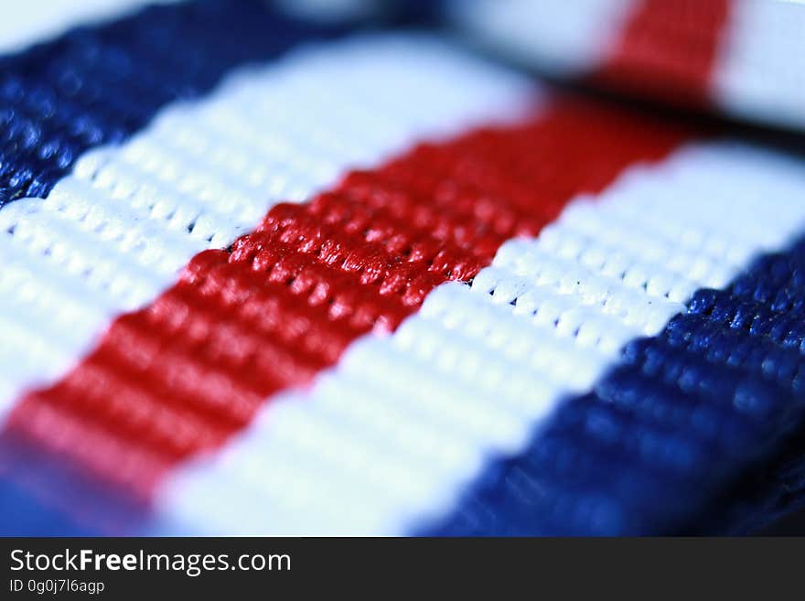 Macro view of red, white and blue striped thread background. Macro view of red, white and blue striped thread background.