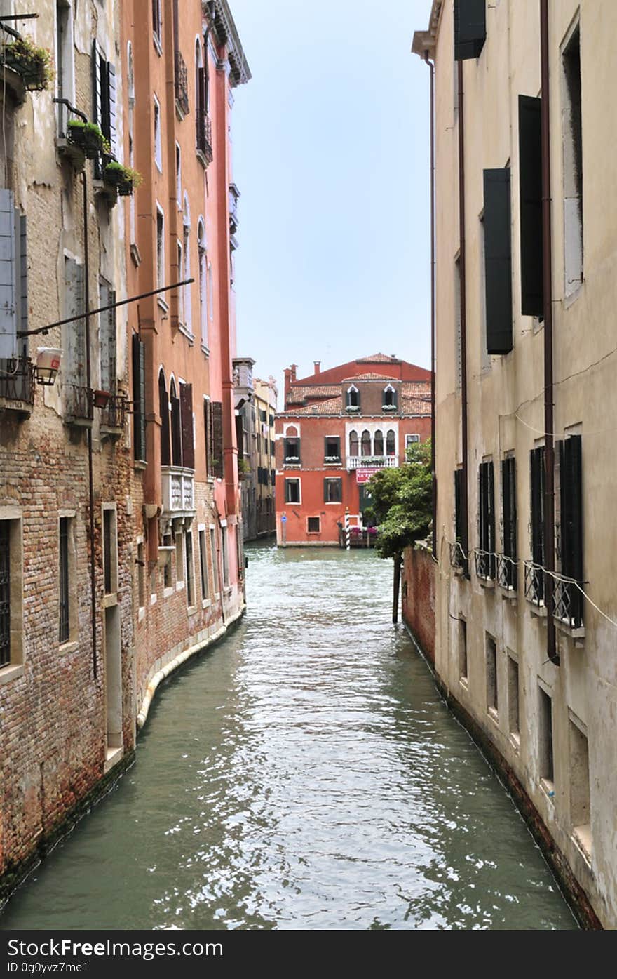 The water streets of Venice are canals which are navigated by gondolas and other small boats. During daylight hours the canals, bridges, and streets of Venice are full of tourists eager to experience the romance of this great travel destination. As night engulfs the town, tourists enjoy some fine dining at one of the many restaurants, leaving the waterways and streets quiet. The gondola is a traditional, flat-bottomed Venetian rowing boat, well suited to the conditions of the Venetian Lagoon. For centuries gondolas were once the chief means of transportation and most common watercraft within Venice. In modern times the iconic boats still have a role in public transport in the city, serving as ferries over the Grand Canal. They are also used in special regattas &#x28;rowing races&#x29; held amongst gondoliers. Their main role, however, is to carry tourists on rides throughout the canals. Gondolas are hand made using 8 different types of wood &#x28;fir, oak, cherry, walnut, elm, mahogany, larch and lime&#x29; and are composed of 280 pieces. The oars are made of beech wood. The left side of the gondola is longer than the right side. This asymmetry causes the gondola to resist the tendency to turn toward the left at the forward stroke. The water streets of Venice are canals which are navigated by gondolas and other small boats. During daylight hours the canals, bridges, and streets of Venice are full of tourists eager to experience the romance of this great travel destination. As night engulfs the town, tourists enjoy some fine dining at one of the many restaurants, leaving the waterways and streets quiet. The gondola is a traditional, flat-bottomed Venetian rowing boat, well suited to the conditions of the Venetian Lagoon. For centuries gondolas were once the chief means of transportation and most common watercraft within Venice. In modern times the iconic boats still have a role in public transport in the city, serving as ferries over the Grand Canal. They are also used in special regattas &#x28;rowing races&#x29; held amongst gondoliers. Their main role, however, is to carry tourists on rides throughout the canals. Gondolas are hand made using 8 different types of wood &#x28;fir, oak, cherry, walnut, elm, mahogany, larch and lime&#x29; and are composed of 280 pieces. The oars are made of beech wood. The left side of the gondola is longer than the right side. This asymmetry causes the gondola to resist the tendency to turn toward the left at the forward stroke.