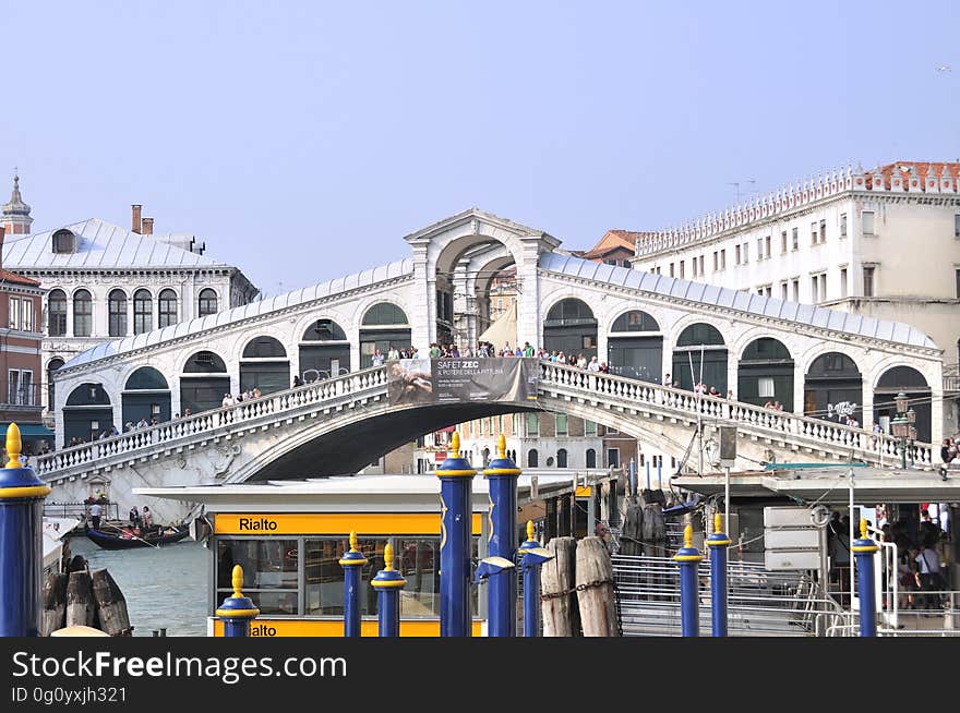 The water streets of Venice are canals which are navigated by gondolas and other small boats. During daylight hours the canals, bridges, and streets of Venice are full of tourists eager to experience the romance of this great travel destination. As night engulfs the town, tourists enjoy some fine dining at one of the many restaurants, leaving the waterways and streets quiet. The gondola is a traditional, flat-bottomed Venetian rowing boat, well suited to the conditions of the Venetian Lagoon. For centuries gondolas were once the chief means of transportation and most common watercraft within Venice. In modern times the iconic boats still have a role in public transport in the city, serving as ferries over the Grand Canal. They are also used in special regattas &#x28;rowing races&#x29; held amongst gondoliers. Their main role, however, is to carry tourists on rides throughout the canals. Gondolas are hand made using 8 different types of wood &#x28;fir, oak, cherry, walnut, elm, mahogany, larch and lime&#x29; and are composed of 280 pieces. The oars are made of beech wood. The left side of the gondola is longer than the right side. This asymmetry causes the gondola to resist the tendency to turn toward the left at the forward stroke. The water streets of Venice are canals which are navigated by gondolas and other small boats. During daylight hours the canals, bridges, and streets of Venice are full of tourists eager to experience the romance of this great travel destination. As night engulfs the town, tourists enjoy some fine dining at one of the many restaurants, leaving the waterways and streets quiet. The gondola is a traditional, flat-bottomed Venetian rowing boat, well suited to the conditions of the Venetian Lagoon. For centuries gondolas were once the chief means of transportation and most common watercraft within Venice. In modern times the iconic boats still have a role in public transport in the city, serving as ferries over the Grand Canal. They are also used in special regattas &#x28;rowing races&#x29; held amongst gondoliers. Their main role, however, is to carry tourists on rides throughout the canals. Gondolas are hand made using 8 different types of wood &#x28;fir, oak, cherry, walnut, elm, mahogany, larch and lime&#x29; and are composed of 280 pieces. The oars are made of beech wood. The left side of the gondola is longer than the right side. This asymmetry causes the gondola to resist the tendency to turn toward the left at the forward stroke.