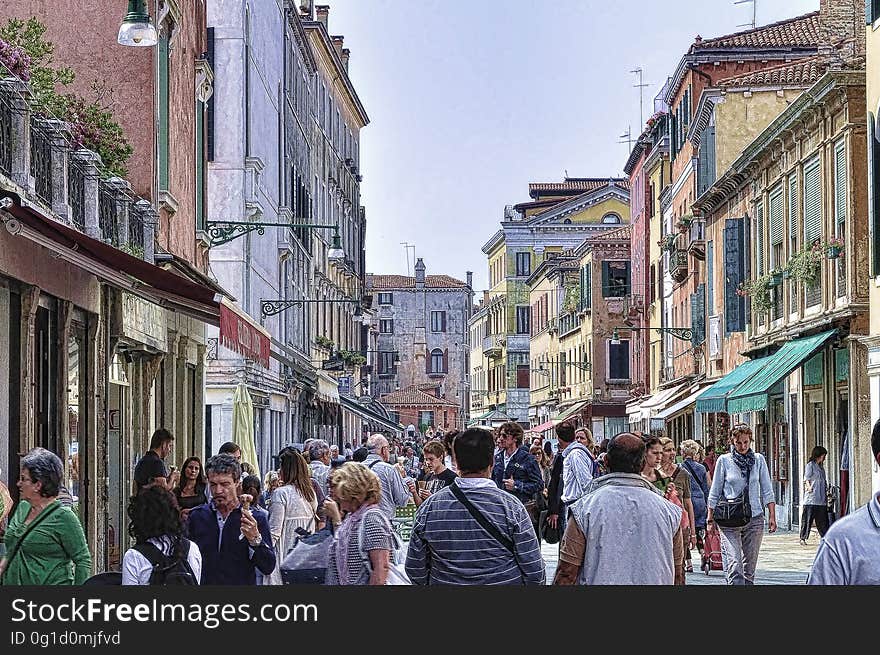 The water streets of Venice are canals which are navigated by gondolas and other small boats. During daylight hours the canals, bridges, and streets of Venice are full of tourists eager to experience the romance of this great travel destination. As night engulfs the town, tourists enjoy some fine dining at one of the many restaurants, leaving the waterways and streets quiet. The gondola is a traditional, flat-bottomed Venetian rowing boat, well suited to the conditions of the Venetian Lagoon. For centuries gondolas were once the chief means of transportation and most common watercraft within Venice. In modern times the iconic boats still have a role in public transport in the city, serving as ferries over the Grand Canal. They are also used in special regattas &#x28;rowing races&#x29; held amongst gondoliers. Their main role, however, is to carry tourists on rides throughout the canals. Gondolas are hand made using 8 different types of wood &#x28;fir, oak, cherry, walnut, elm, mahogany, larch and lime&#x29; and are composed of 280 pieces. The oars are made of beech wood. The left side of the gondola is longer than the right side. This asymmetry causes the gondola to resist the tendency to turn toward the left at the forward stroke. The water streets of Venice are canals which are navigated by gondolas and other small boats. During daylight hours the canals, bridges, and streets of Venice are full of tourists eager to experience the romance of this great travel destination. As night engulfs the town, tourists enjoy some fine dining at one of the many restaurants, leaving the waterways and streets quiet. The gondola is a traditional, flat-bottomed Venetian rowing boat, well suited to the conditions of the Venetian Lagoon. For centuries gondolas were once the chief means of transportation and most common watercraft within Venice. In modern times the iconic boats still have a role in public transport in the city, serving as ferries over the Grand Canal. They are also used in special regattas &#x28;rowing races&#x29; held amongst gondoliers. Their main role, however, is to carry tourists on rides throughout the canals. Gondolas are hand made using 8 different types of wood &#x28;fir, oak, cherry, walnut, elm, mahogany, larch and lime&#x29; and are composed of 280 pieces. The oars are made of beech wood. The left side of the gondola is longer than the right side. This asymmetry causes the gondola to resist the tendency to turn toward the left at the forward stroke.