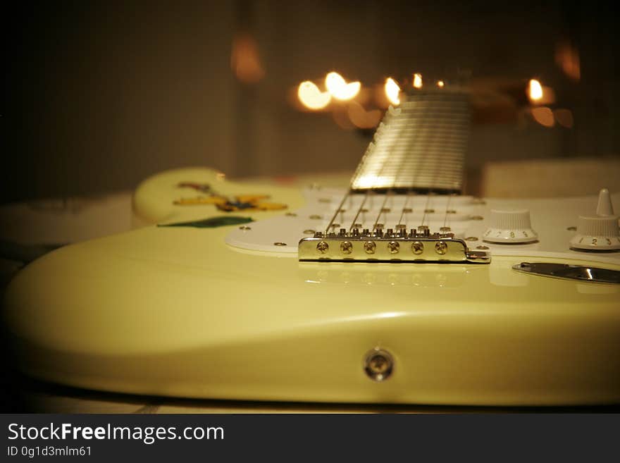 Yellow and White Stratocaster Electric Guitar